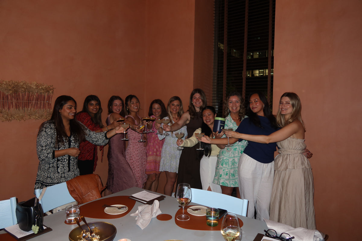 Australian protein powder community dinner in Sydney with guests featuring a Matcha protein powder jar