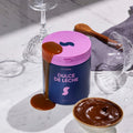 Dulce De Leche protein powder jar by Daily Shake
