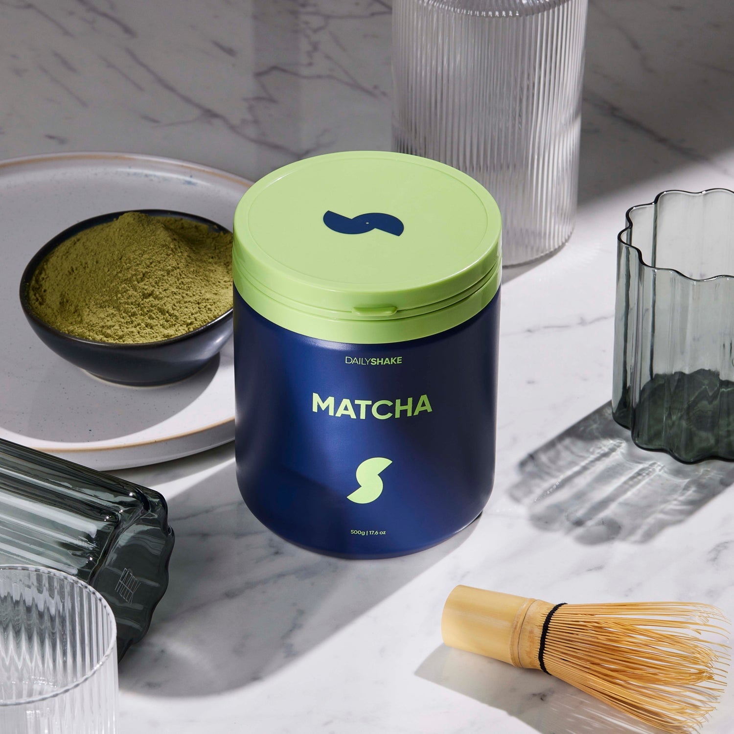 Matcha protein powder jar by Daily Shake