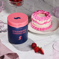Strawberry Cheesecake protein powder jar by Daily Shake